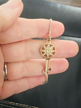 Gold Key Pendant Bracelet with Sparkling Crystal Flower